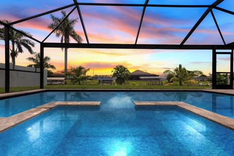 Dive into relaxation while soaking in breathtaking sunset views