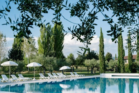 Indoor pool, seasonal outdoor pool, pool umbrellas, sun loungers