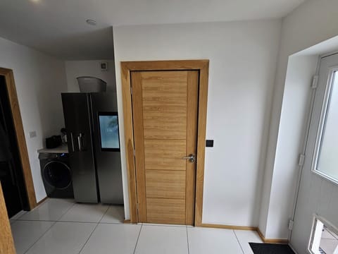 Utility room leading to downstairs wc