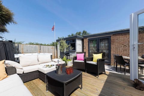 Sunny deck with comfy outdoor seating