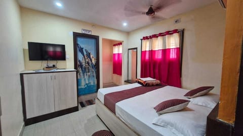 Premium bedding, down comforters, laptop workspace