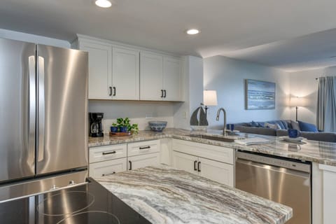 The brand-new kitchen is fully stocked with everything you need to prepare your favorite foods and drinks.