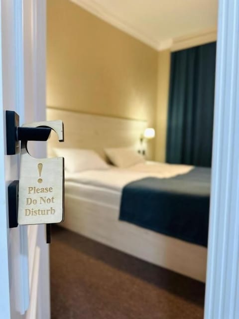 Deluxe Double Room, City View | Premium bedding, minibar, in-room safe, individually decorated