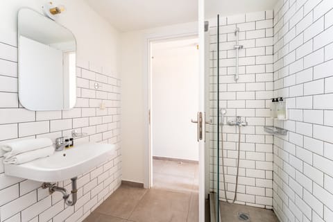 Shower, hair dryer, soap, shampoo