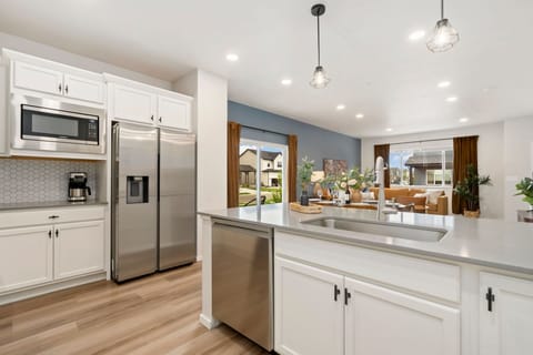 Townhome, Multiple Beds, Patio (2938 Barnstormer St Unit #1) | Private kitchen | Fridge, microwave, oven, stovetop