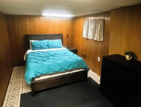 Cozy queen bedroom with comfy bed, soft lighting, and peaceful vibes.