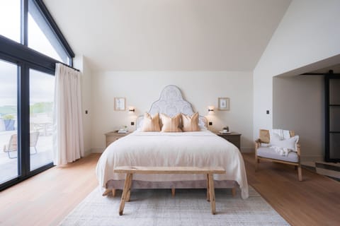 Master bedroom with free standing bath and double shower