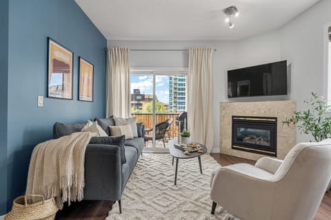 Welcome to our charming 2-bedroom condo nestled in the heart of Calgary's vibrant Beltline neighborhood. With its transitional design and coastal colour palette, this inviting space offers a relaxing and stylish retreat for your stay in the city.