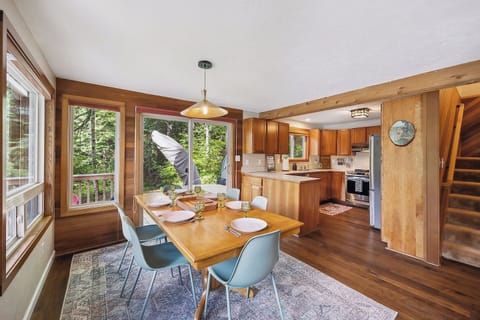 Open concept kitchen and dining area keeps the whole group engaged while memories are made.