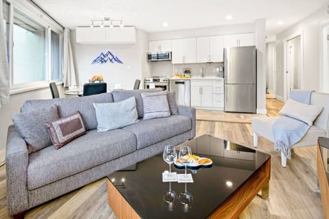 Open-concept layout combining kitchen, dining, and living areas.