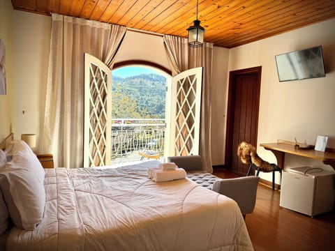 Superior Room, Balcony, Mountain View | Minibar, desk, laptop workspace, free WiFi