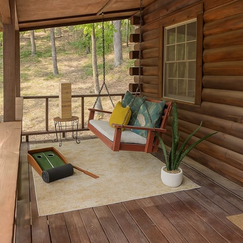 Start your mornings with a fresh brew on the covered porch swing. This secluded spot is where you’ll listen to the birds and plan your hike through the surrounding Arkansas timberland.
