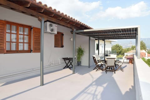 Enjoy your morning coffee on the spacious front terrace with charming countryside views.