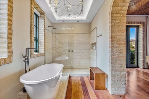 Premium Suite, Garden View | Bathroom | Shower, hair dryer, slippers, towels