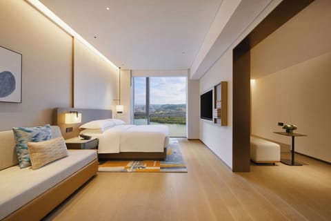 Family Studio Suite, 1 King Bed with Sofa bed, Lake View | In-room safe, laptop workspace, blackout drapes, iron/ironing board