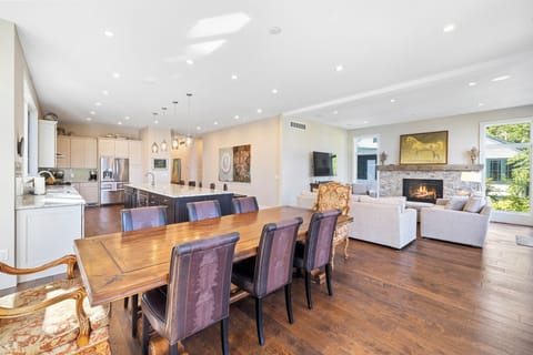 Open-concept kitchen flows seamlessly into the living room.