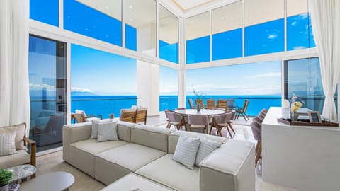 Luxury Apartment, 4 Bedrooms, Balcony, Ocean View | Living area | 49-inch flat-screen TV with digital channels, Netflix