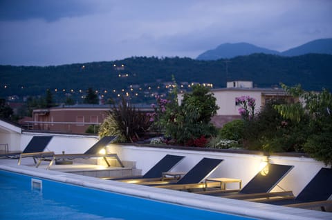 Seasonal outdoor pool, pool umbrellas, sun loungers
