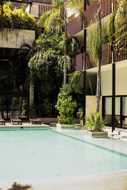 Outdoor pool, pool umbrellas, sun loungers
