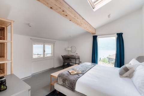 Apartment, Patio, Lake View | Premium bedding, down comforters, iron/ironing board, cribs/infant beds