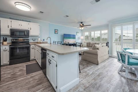 Condo, 1 Queen Bed with Sofa bed, Balcony, Garden View (Emerald Isle Escape) | Private kitchen | Fridge, microwave, oven, stovetop