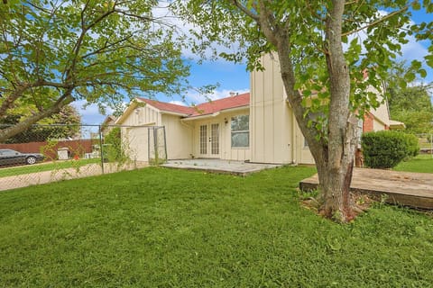 A view of the fully-fenced backyard of the property.