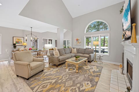 The open layout flows seamlessly to the deck, creating an ideal space for morning coffee, reading, or quiet conversation