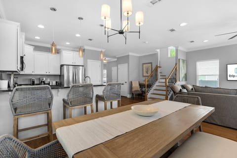 Spacious dining area with plush table seating for 8