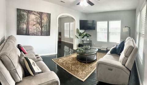 Recliners have foot rests and cupholders