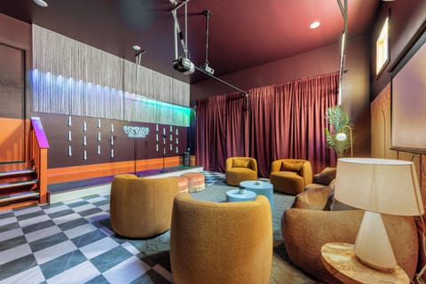 Speakeasy karaoke lounge: seating, stage & neon, wireless mics, projector & vibe