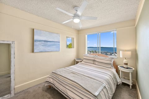 Bedroom with water views, queen bed