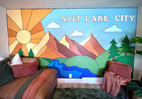 Welcome to SLC.  Make sure you get a picture with the mural to post online.  