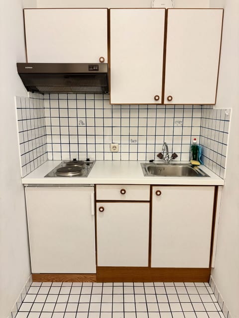 Classic Apartment, Balcony, Mountain View | Private kitchen | Highchair