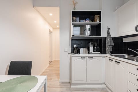 The kitchen has a convenient dishwasher to make cleanup effortless.