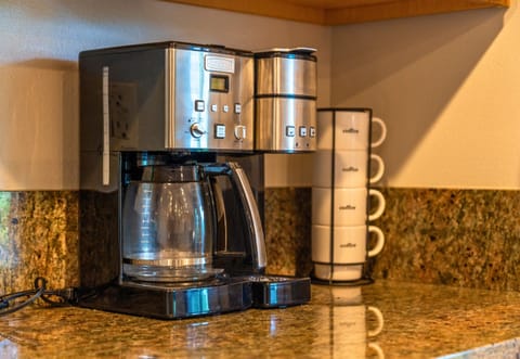 Wake up to fresh coffee brewed in our fully stocked kitchen—your mornings just got better.