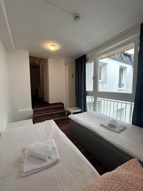Twin Room | Individually furnished, iron/ironing board, free WiFi, bed sheets