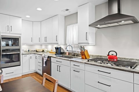Kitchen: Contemporary amenities and ample counter space make cooking a joy in this kitchen.