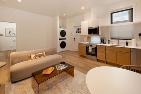 Spacious living and kitchen area with ample supplies