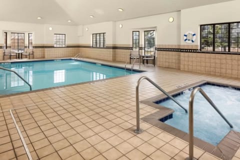 Soak up the calm with spacious poolside seating.