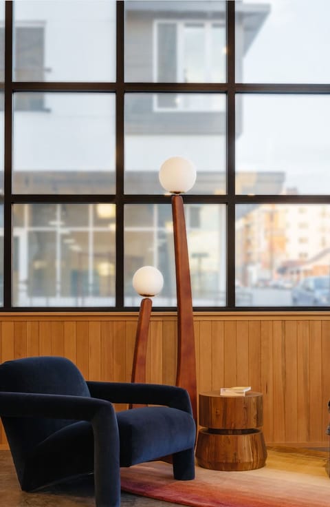 Recharge quietly in a modern corner with soft ambient glow.