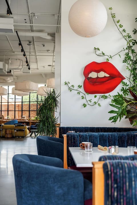 Start your morning with coffee in this art-filled dining nook.