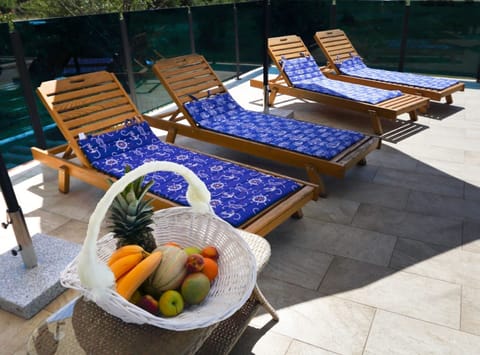 House (Five Bedroom Holiday Home) | Outdoor pool | Outdoor pool, pool umbrellas, sun loungers