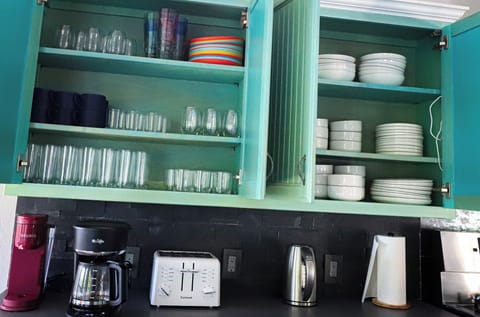 Plenty of plates, cutlery, nonstick and stainless-steel pots/pans