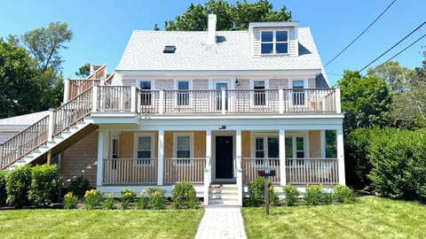 front of the house; yard, covered porch
