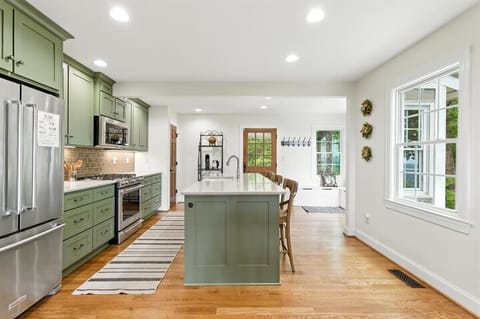 Spacious and tidy kitchen to set the mood for cooking and gathering 