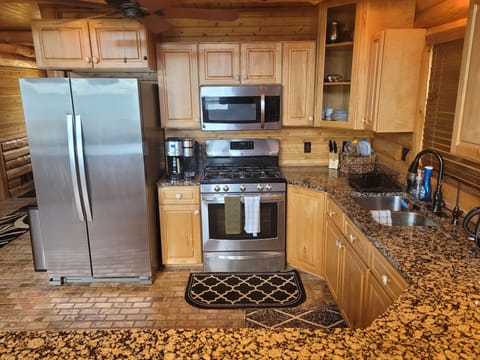 KITCHEN:  The functional kitchen with all basic cook ware and even a coffeemaker a popcorn maker