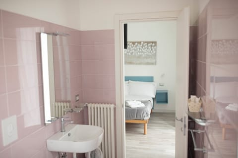 Superior Double Room, Balcony, City View | Bathroom | Shower, hair dryer, towels, soap