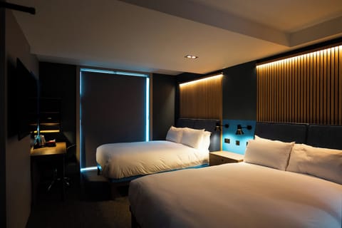 Family Room, 2 King Beds | Desk, laptop workspace, blackout drapes, iron/ironing board