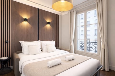 Signature Apartment, Courtyard View | Living area | 80-cm Smart TV with digital channels