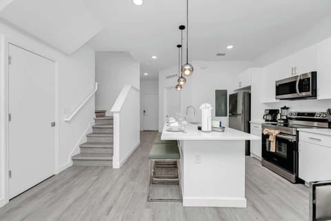 Cook up a storm in a kitchen stocked with all the essentials and modern appliances.